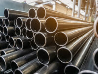 high quality Galvanized steel pipe or Aluminum and chrome stainless pipes in stack waiting for shipment  in warehouse